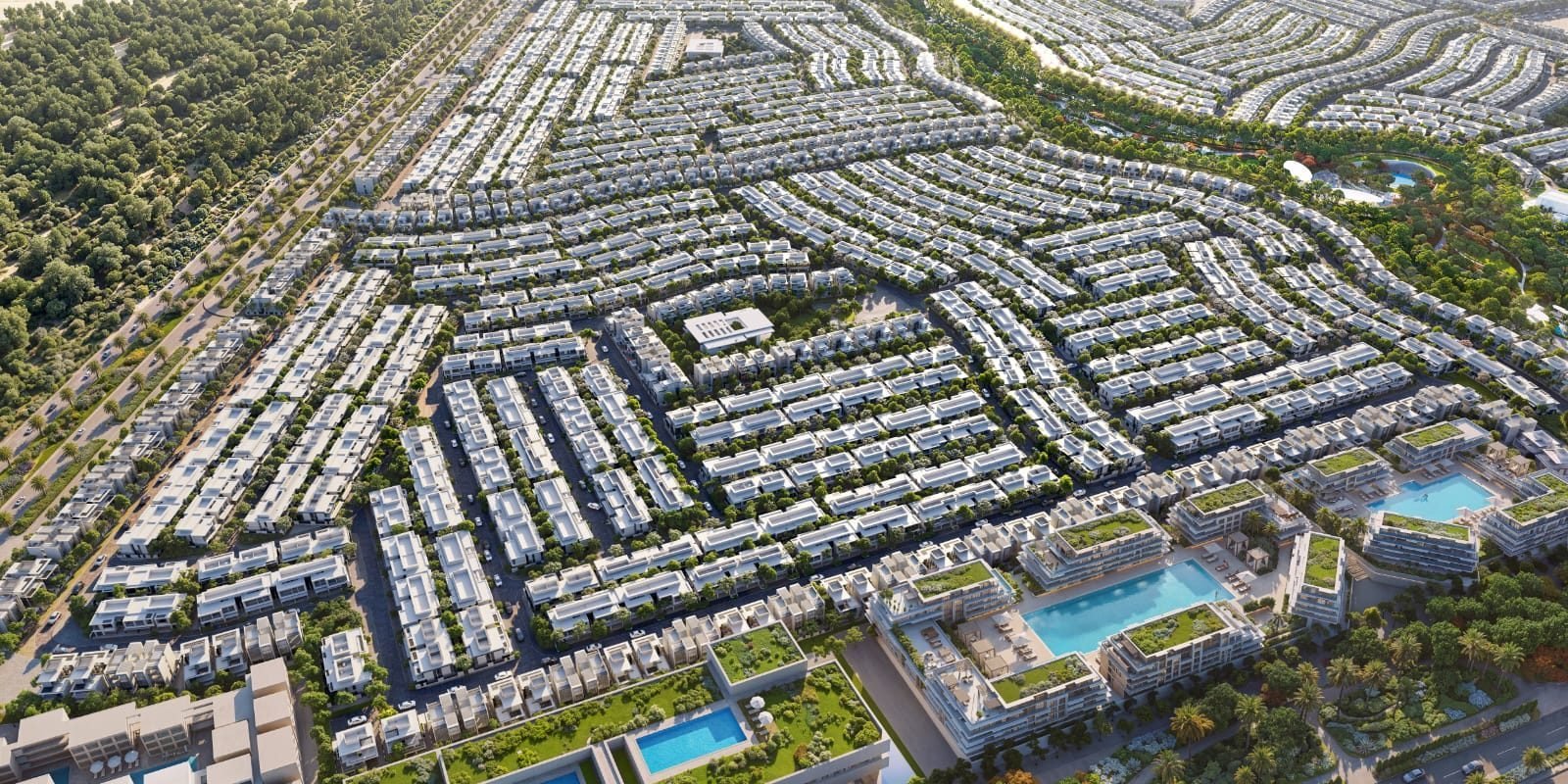 A clubhouse and swimming pools at the centre of an Azizi Florence cluster, seen from above.