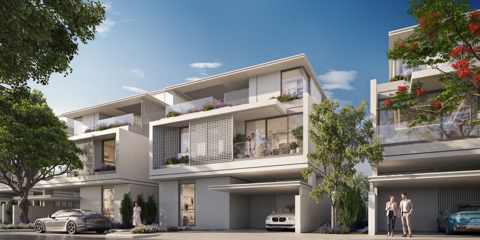 A terrace of Azizi Florence townhouses with ground-floor garages.